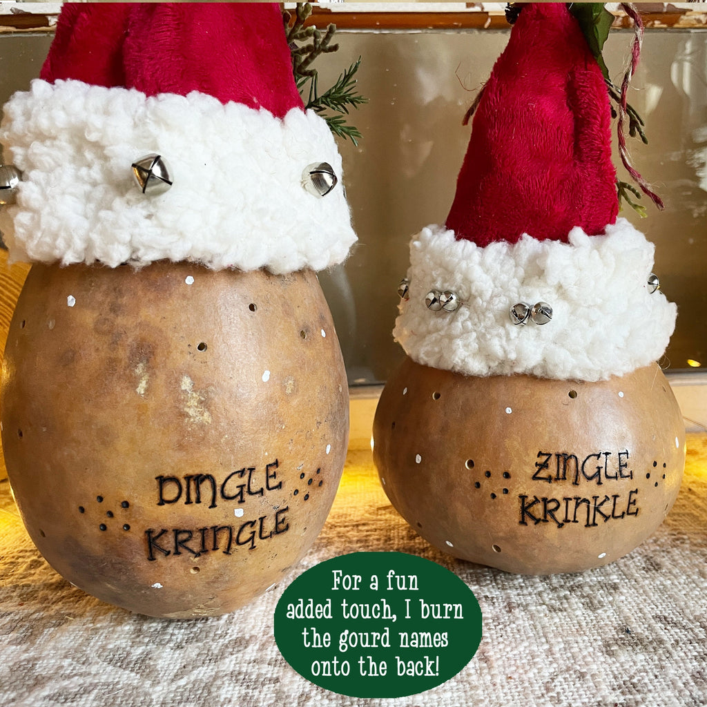 Two gourd ornaments with Santa hats and names 'Dingle Kringle' and 'Zingle Krinkle'.
