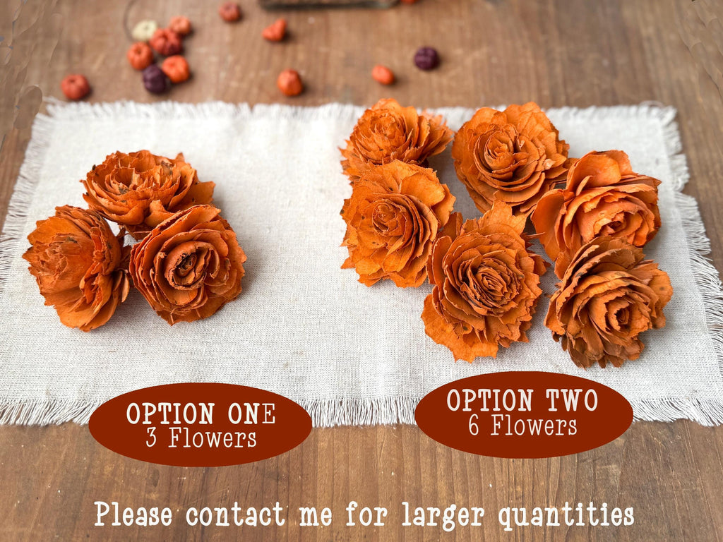 Orange flowers on a white cloth with quantity options labeled.
