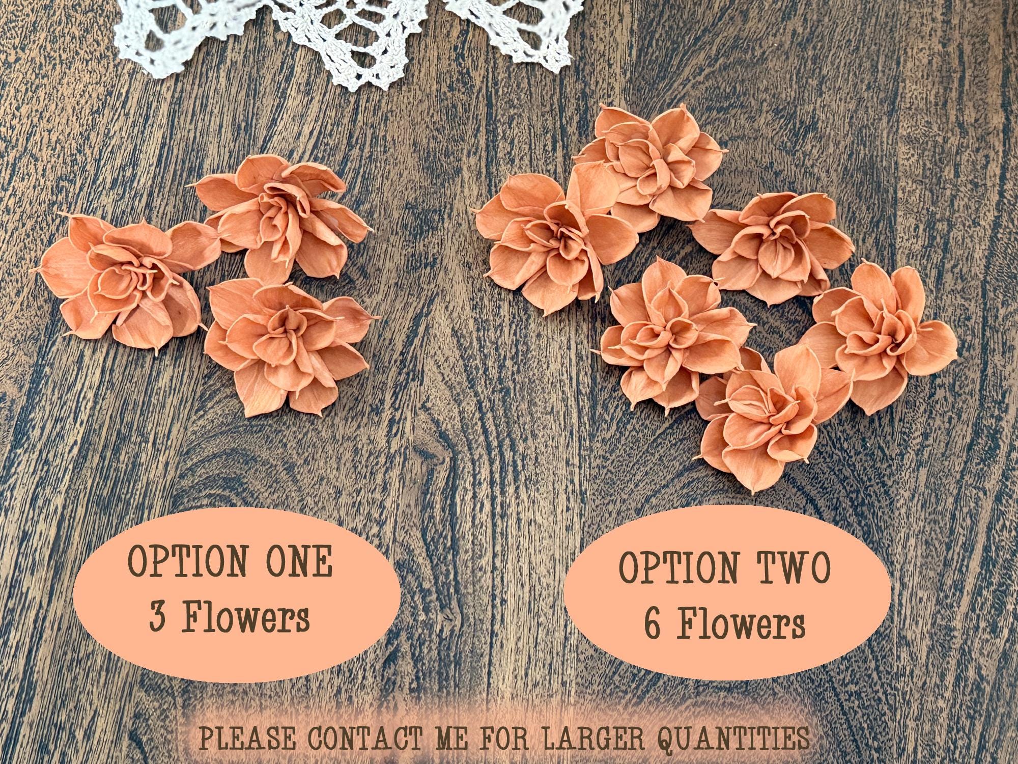 Two sets of peach-colored flowers labeled 'Option One' with 3 flowers and 'Option Two' with 6 flowers on a wooden surface.