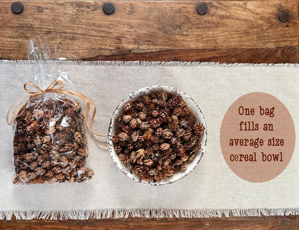 Bag of granola next to a bowl filled with granola on a wooden surface.