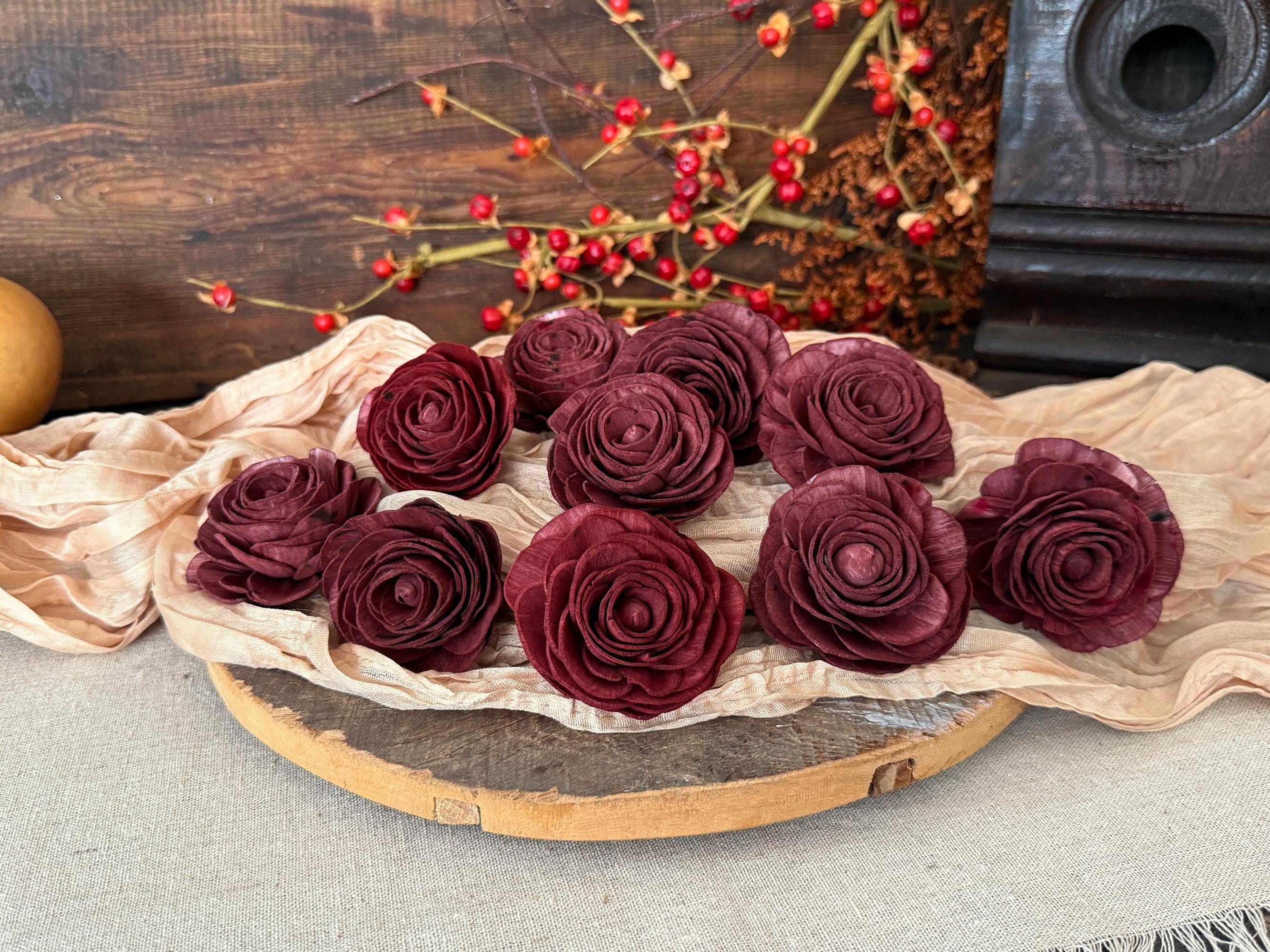 Wood flower on a wooden surface with a rustic background