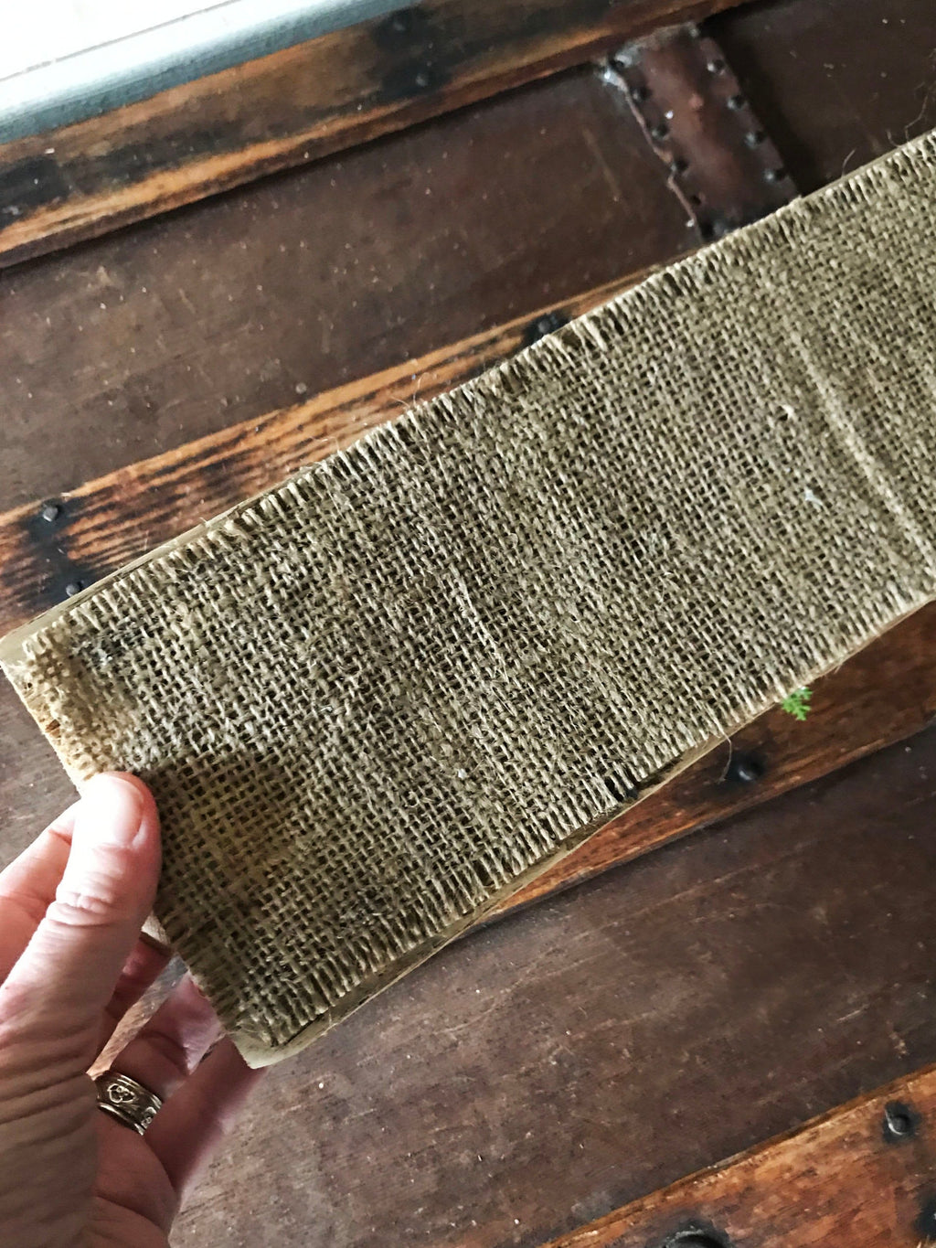 Burlap liner on bottom of yule log.