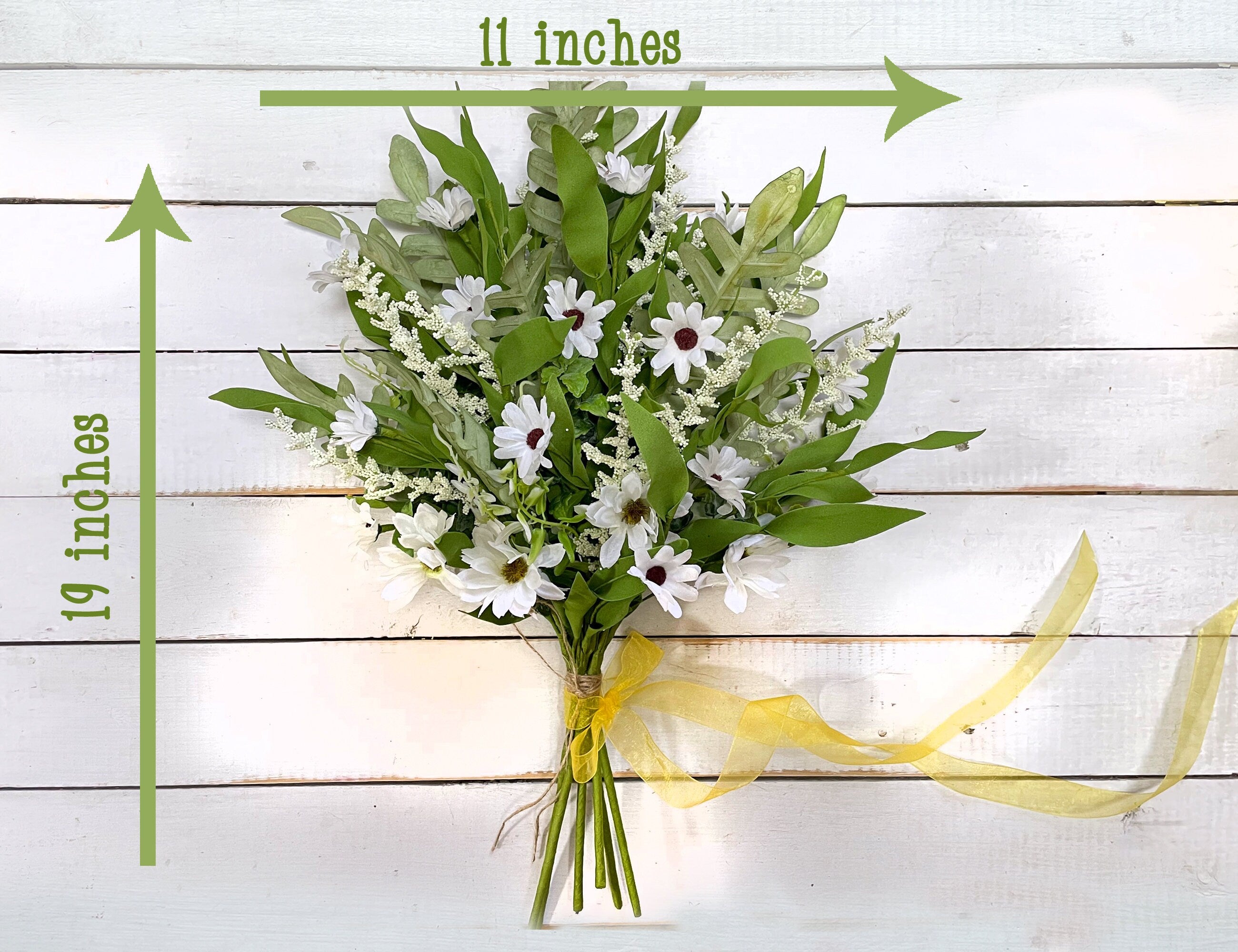 Bouquet of flowers with measurements on a wooden background
