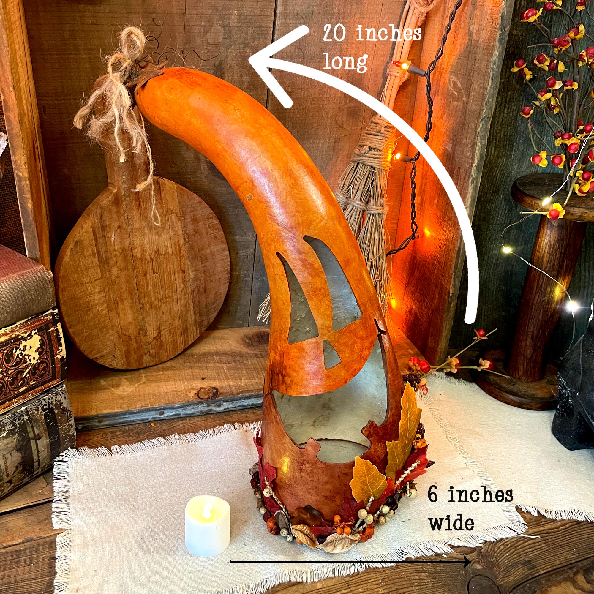 Decorative wooden pumpkin with measurements on a rustic background