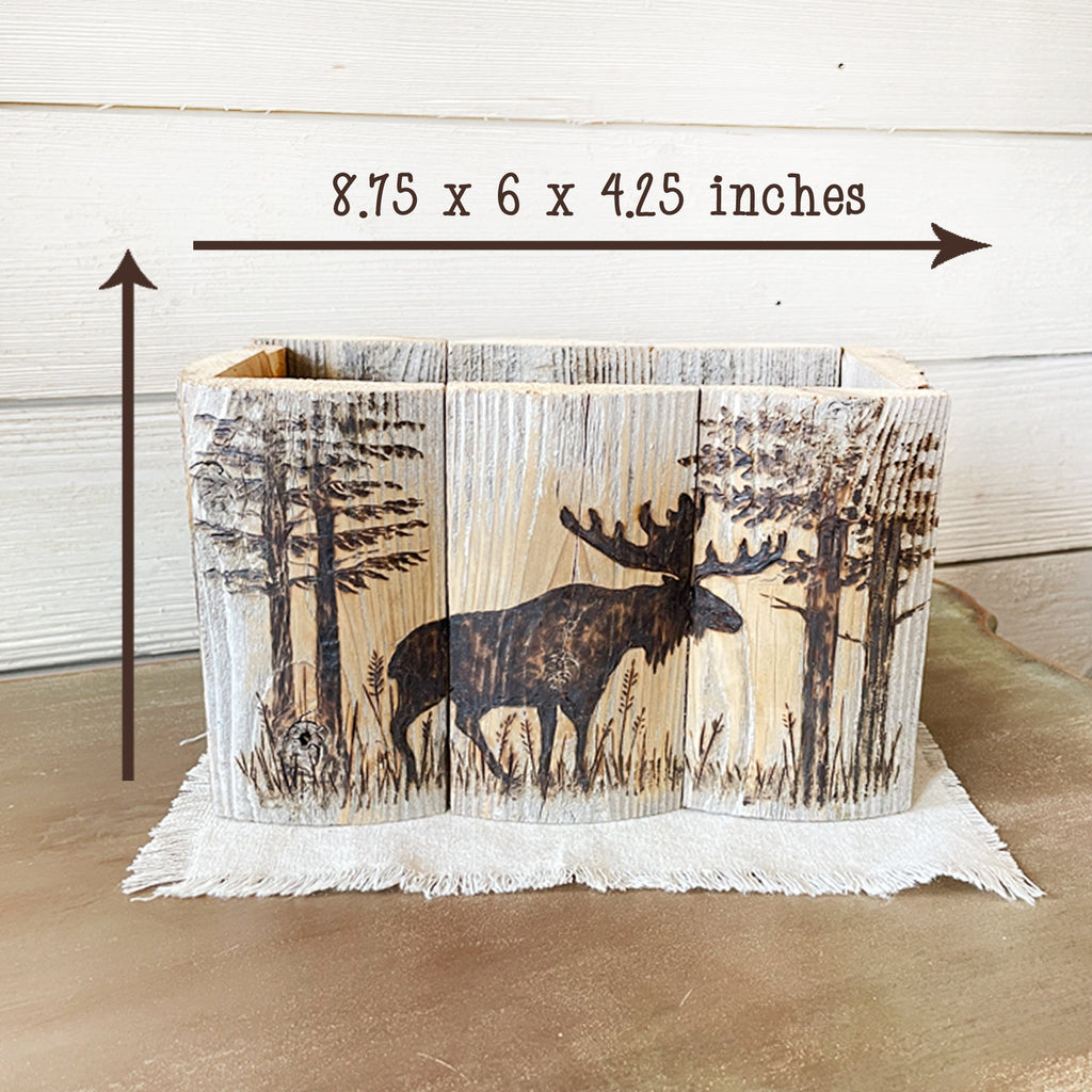 Wooden planter with moose design and dimensions displayed
