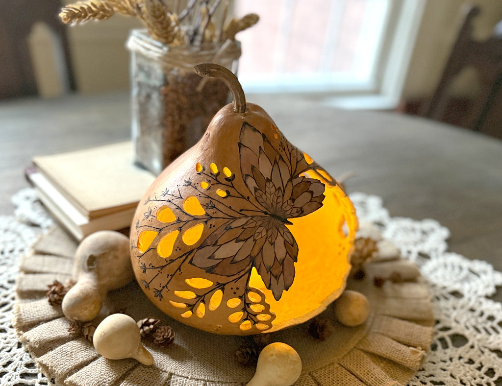 Butterfly luminary sitting on dinning room table as centerpiece