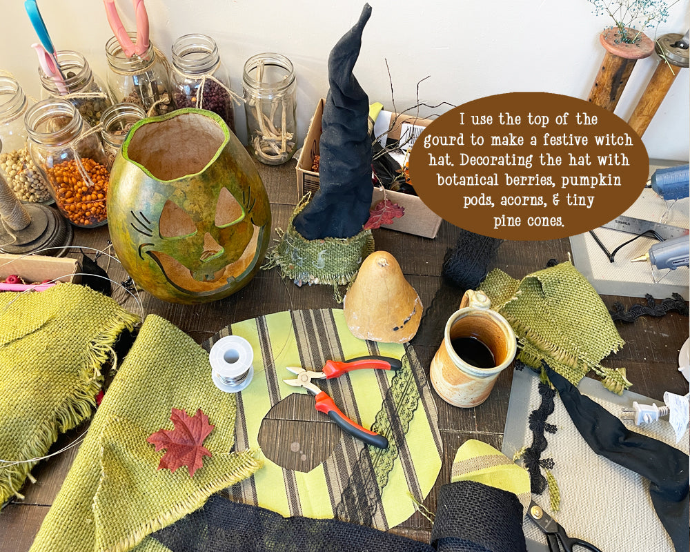 Image shows the cut fabric and supplies used to make the witch hat. 