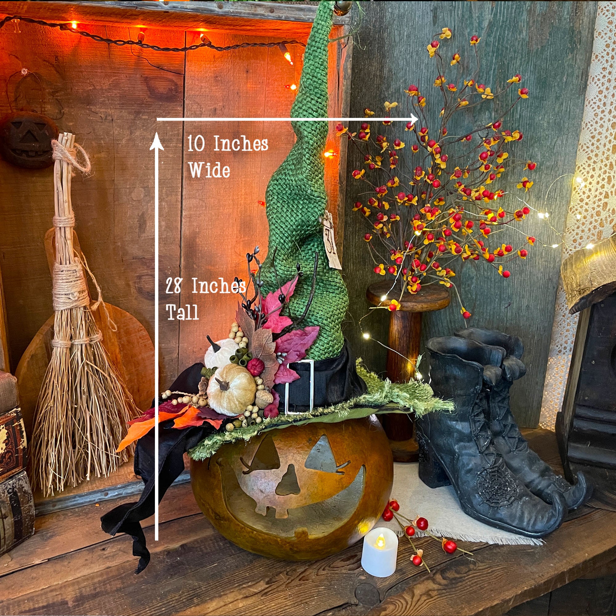 Image shows dimensions of pumpkin witch decoration included the height of the hat. 