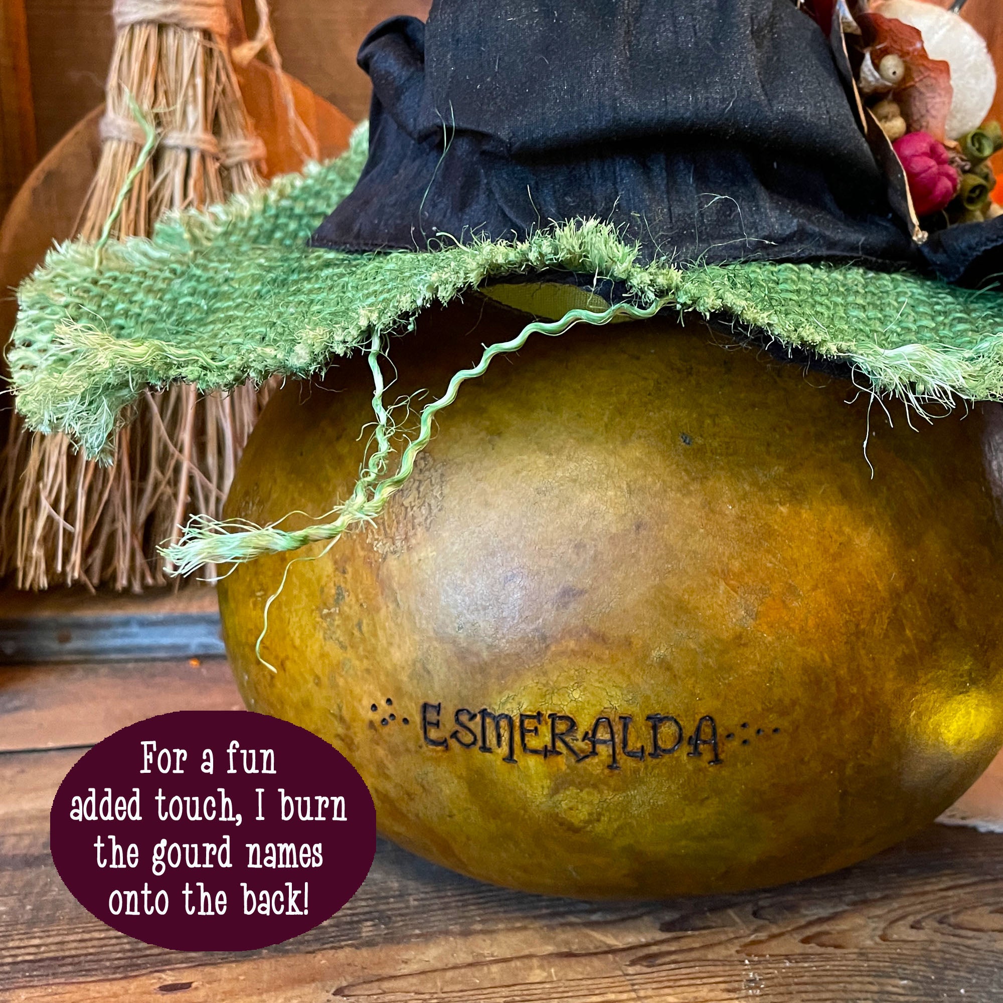 The back of the pumpkin witch with her name, Esmeralda, engraved into the shell.