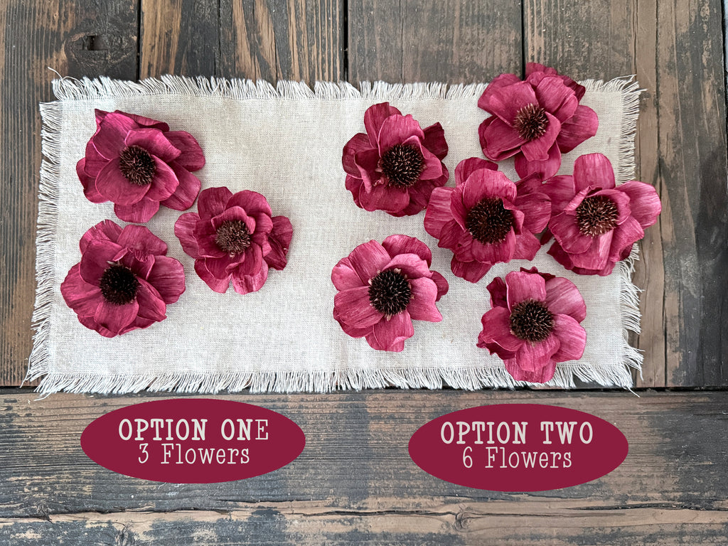 Set of red flowers on a white fabric with 'Option One' and 'Option Two' labels.