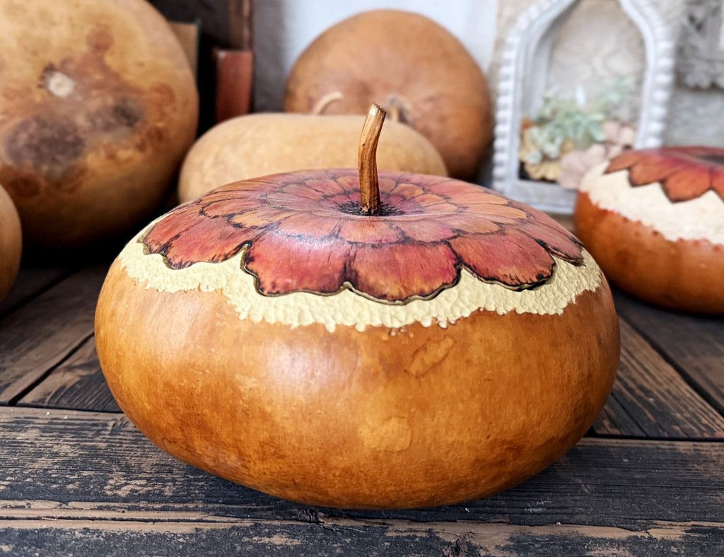 Side view of handcrafted zinnia gourd bowl showing natural texture and finish