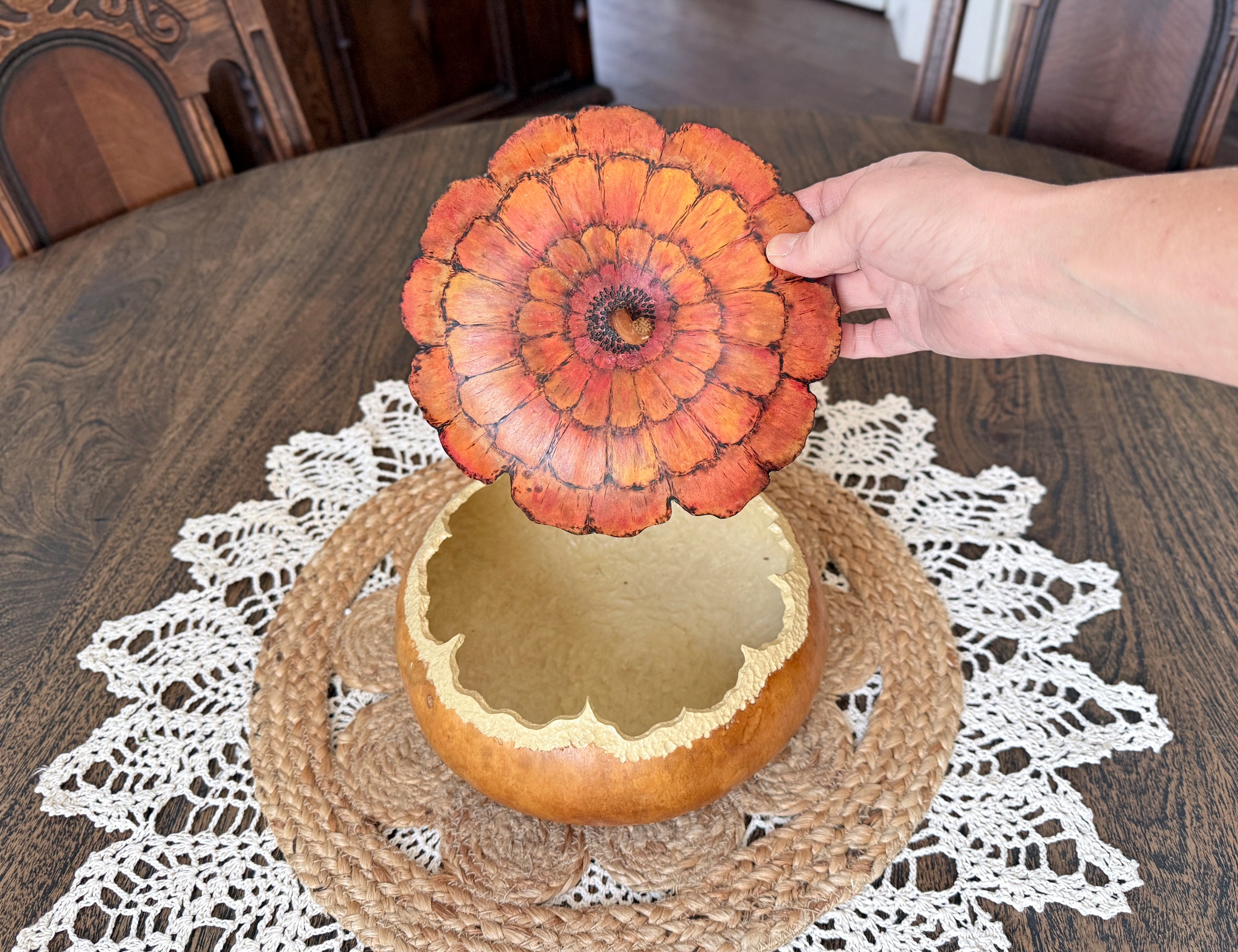 Decorative gourd bowl with fitted zinnia lid, lid removed to show interior