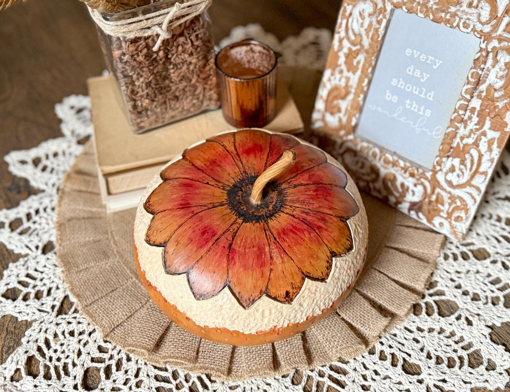 hand carved gourd bowl with flower shaped lid.