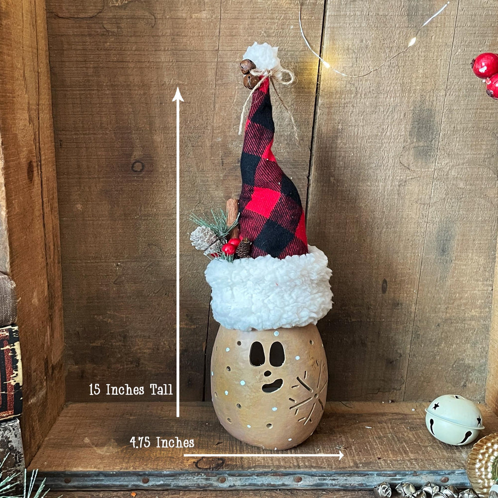 Decorative gnome in a jar with measurements on a wooden background