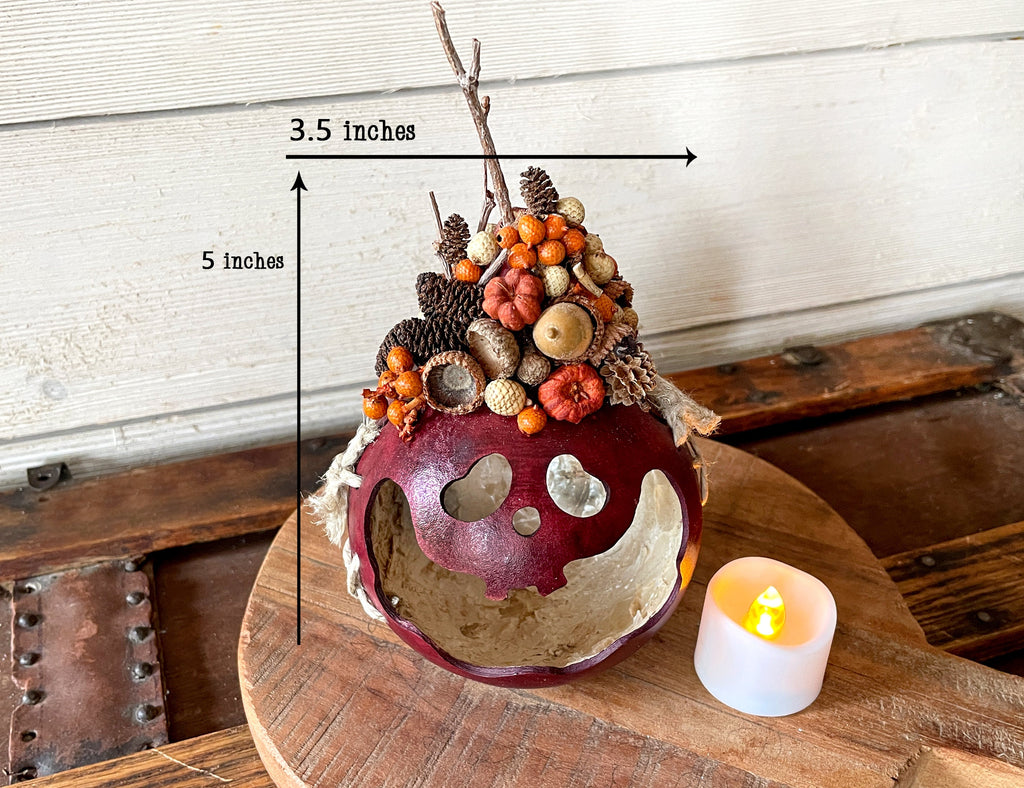 Decorative item with measurements on a wooden surface