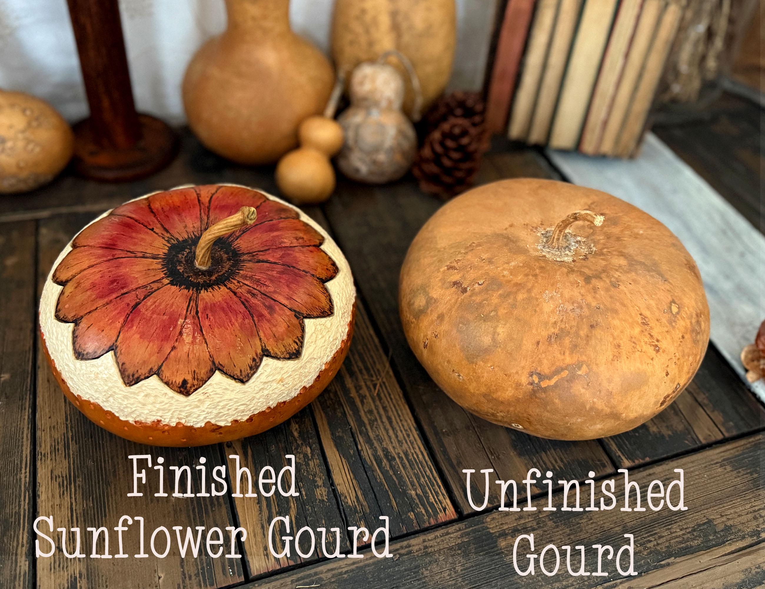 Two gourds, one painted with a sunflower design and labeled 'Finished Sunflower Gourd', the other natural and labeled 'Unfinished Gourd', on a wooden surface.