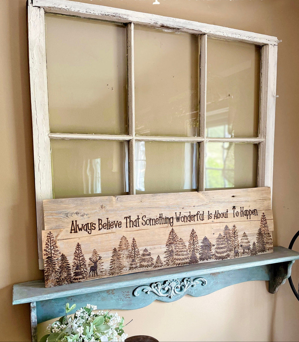 Decorative shelf made from an old window with a motivational quote and nature design, featuring the website www.boutiquebarn.