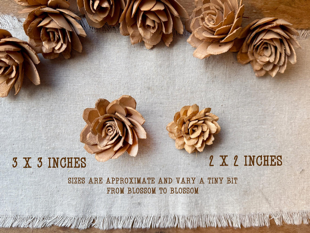 Wooden flowers on a textured fabric background with size measurements.