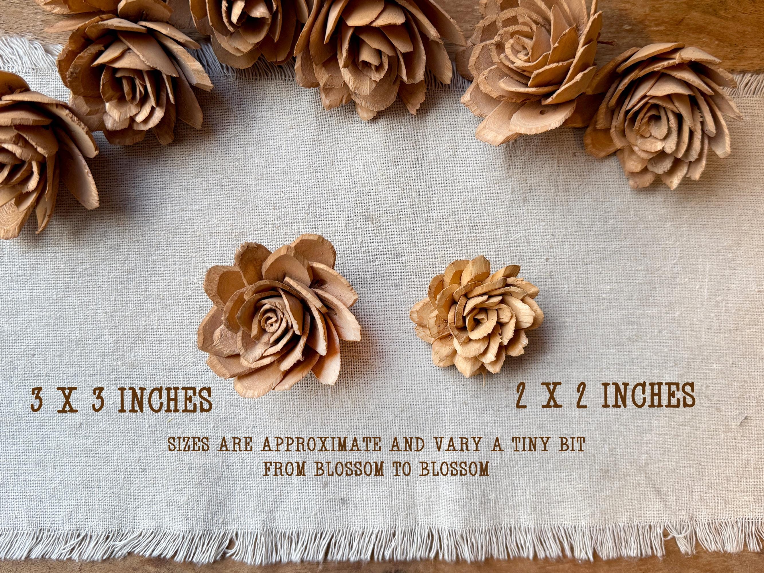 Wooden flowers on a textured fabric background with size measurements.