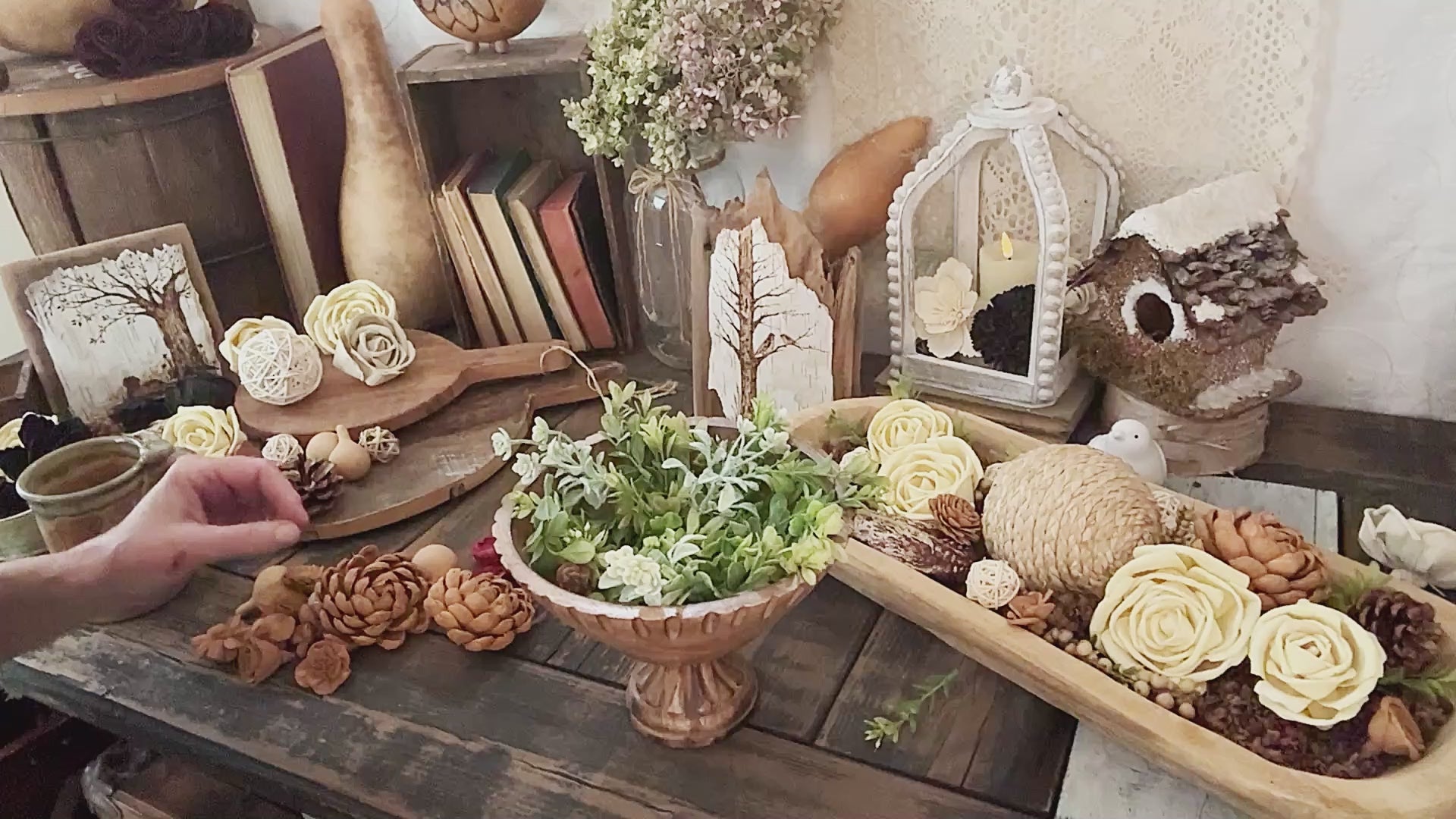 Demonstration of decorative teak wood bowl arrangement for table.