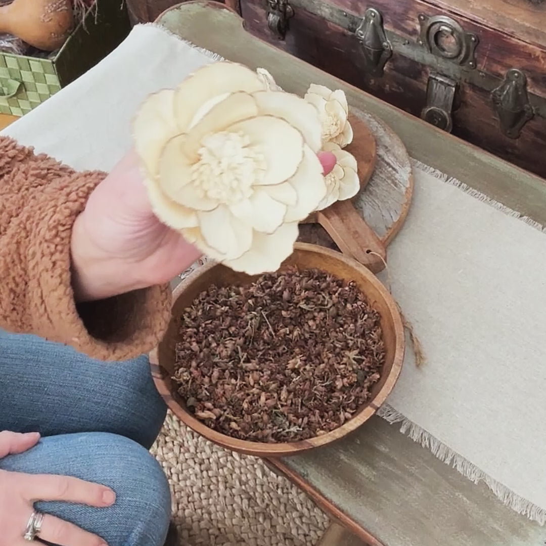 video showing me styling a rustic wood bowl arrangement.