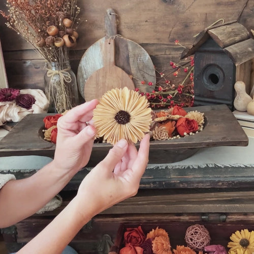 DIY dough bowl botanical arrangement with wood Gerba daisy.
