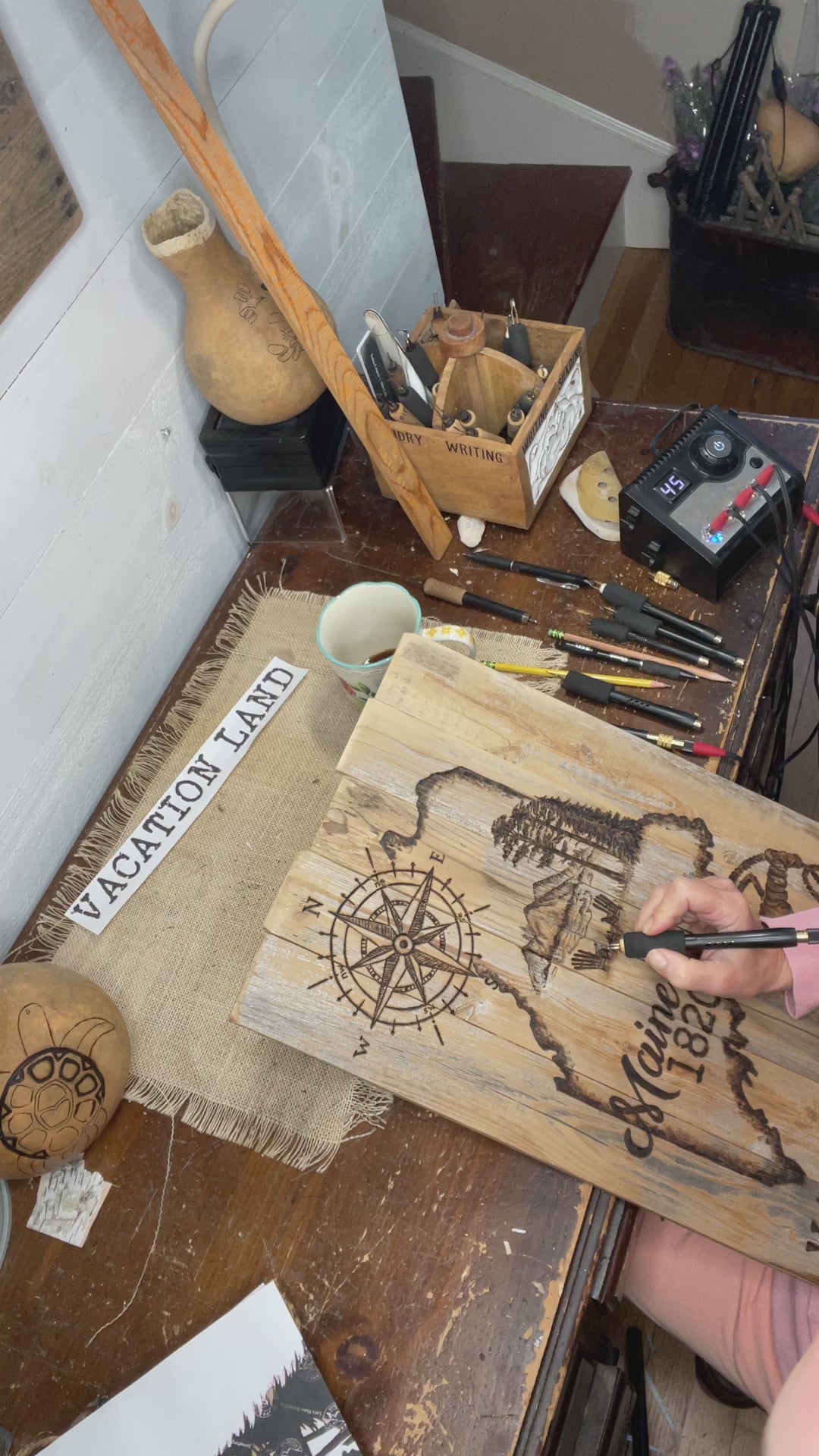  this shows me wood burning lakeside artwork on Maine state wall art